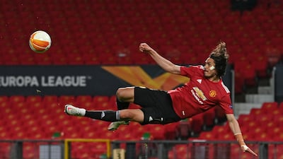 Manchester United striker Edinson Cavani shoots for goal in their 6-2 Europa League semi-final, first leg victory over Roma at Old Trafford, on Thursday, April 29. AFP