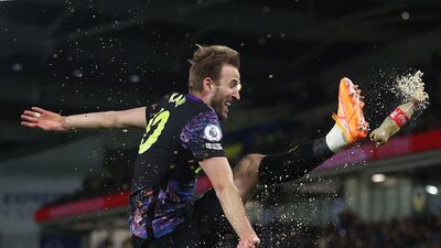 Harry Kane celebrates after scoring for Spurs. Getty