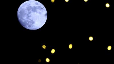 A suitably icy-looking Cold Moon rises over Tirana, Albania. Reuters
