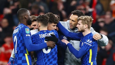 Chelsea's Kepa Arrizabalaga is consoled by teammates after the match. Reuters