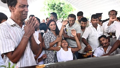 Relatives mourn. AFP