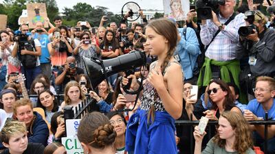Swedish environment activist Greta Thunberg speaks at a climate protest outside the White House in Washington, DC on September 13, 2019. - Thunberg, 16, has spurred teenagers and students around the world to strike from school every Friday under the rallying cry "Fridays for future" to call on adults to act now to save the planet. AFP