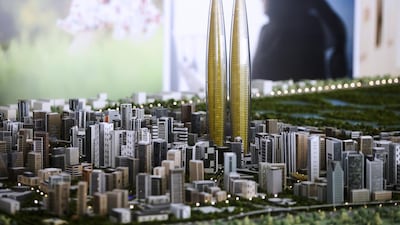 Above, a maquette of the twin towers that will be built within the Dubai Creek Residences development. Upon completion they would be the tallest twin towers in the world. Lee Hoagland / The National