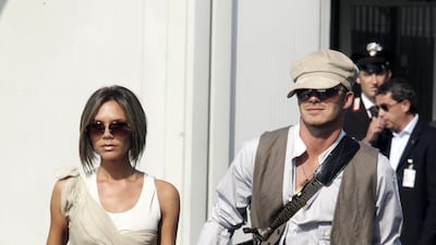 Victoria and David Beckham, in a waistcoat and flat cap, attend the 63rd Venice Film Festival on September 7, 2006 in Venice, Italy. Getty Images