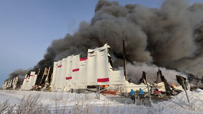 Smoke billows into the sky from a huge blaze at the warehouse of online retailer Wildberries in Saint Petersburg, Russia. Reuters