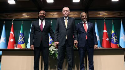 Turkish President Recep Tayyip Erdogan poses with Somali President Hassan Sheikh Mohamud and Ethiopian Prime Minister Abiy Ahmed in Ankara on Wednesday. Reuters