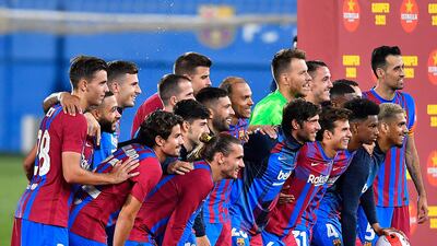 Barcelona's players celebrate after winning the 56th Joan Gamper Trophy friendly.