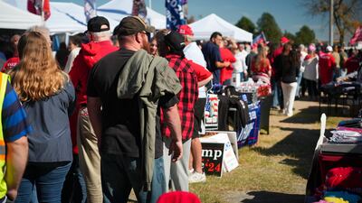 Thousands of people queued up in the heat hoping to see Donald Trump in Salem, Virginia, on November 2, 2024 (Joshua Longmore / The National)