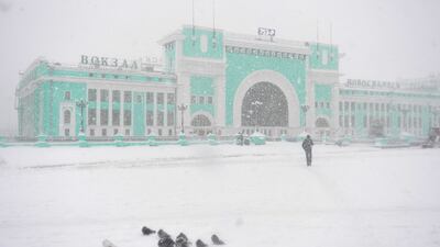 Snow falls in front of the railway station in Novosibirsk, southern Russia. Reuters