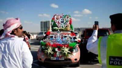 People join in celebration and show off their decorated cars during the Spirit of Union Parade on Thursday evening, Dec. 1, 2011, at the Yas Island near Abu Dhabi. (Silvia Razgova/The National)