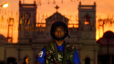 A security officer stands guard outside St. Anthony's Shrine, days after a string of suicide bomb attacks on churches and luxury hotels across the island on Easter Sunday, in Colombo, Sri Lanka. REUTERS