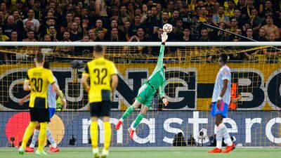 Manchester United goalkeeper David de Gea makes a save. Reuters