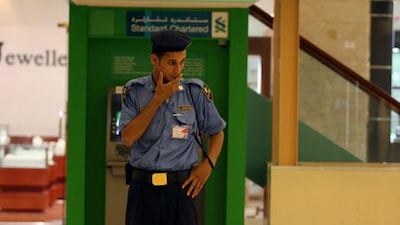 Should security guards in the UAE be armed? Police say not, but some employed in the industry say they feel 'helpless'.