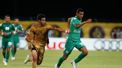 Dubai, pictured in gold against Al Shabab, have struggled this season and have just two points from seven Pro League games.