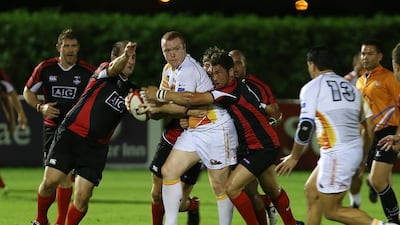 The Dubai Exiles, in black, have signalled their intentions to rejoin the elite of Middle East rugby by announcing the appointment of a new director of rugby. Pawan Singh / The National