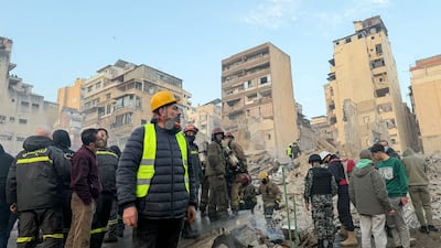 Firefighters at the site of the Israeli air strike. Lebanon's official National News Agency (NNA) said that a building in central Bachoura neighbourhood was hit. AFP