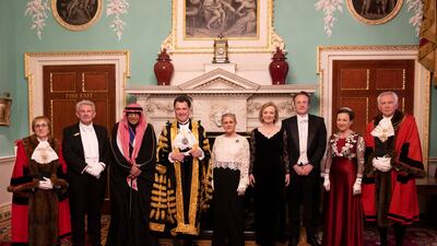 Lord Mayor of the City of London, Vincent Keaveny (C) and the Rt Hon Elizabeth Truss MP, The Secretary of State for Foreign, Commonwealth and Development Affairs (4th R) and His Excellency Khaled Abdulaziz Al-Duwaisan GCVO, The Ambassador of the State of Kuwait on April 27, 2022 in London, England. Getty.