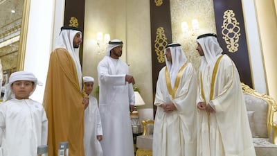 HH Sheikh Humaid and Sheikh Ammar receive well-wishers at Al Zaher Palace. WAM