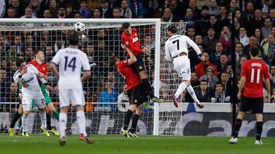 Cristiano Ronaldo heads home an equaliser for Real Madrid against Manchester United in the Champions League at Old Trafford in 2013. AFP