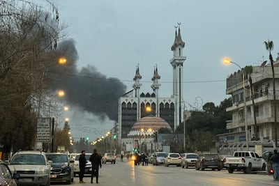 Smoke rises from the site of artillery shelling that struck the area near Aleppo’s Abdelrahman Mosque on Thursday. AFP