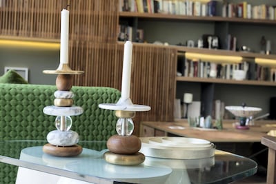 The Wax and Fire candle stands in Fadi Sarieddine's Barsha South villa. Ruel Pableo for The National