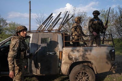 Ukrainian servicemen hold their positions at an undisclosed location near the frontline in Ukraine. AFP