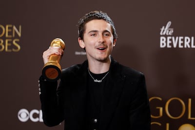 Timothee Chalamet poses with the Best Performance by a Male Actor in a Motion Picture - Musical or Comedy Marty Supreme. EPA