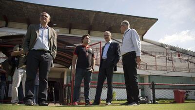 Brazilian Sports Minister Aldo Rebelo, second right, visit the grounds of Flamengo on Monday ahead of the Dutch national team's arrival to train there. Vanderlei Almeida / AFP / May 5, 2014