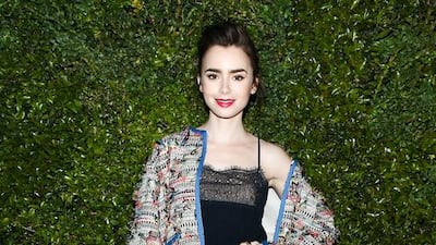 Golden Globa-nominated actress Lily Collins wore a multicoloured cotton tweed jacket and skirt, and a navy georgette crepe dress, from Chanel’s spring/summer 2017 ready-to-wear collection. She teamed the look with Chanel shoes, Coco Crush diamond rings and the Comète Spirale diamond earcuff from Chanel Fine Jewelry. Courtesy Chanel