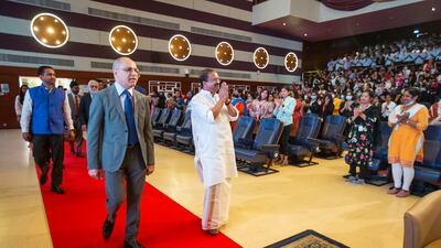 Mr Muraleedharan is given a standing ovation as he arrives