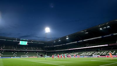 Players vie for the ball during the German first division Bundesliga football match Werder Bremen v Bayer 04 Leverkusen in Bremen, northern Germany as the season resumed following a two-month absence due to the novel coronavirus COVID-19 pandemic. AFP