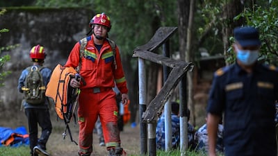 Chinese fire and rescue personnel arrive at Trishuli camp after inspecting the tunnel site in Rasuwa, Nepal. AFP