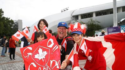Fans of Canada pose for a photo as they arrive at the Fukuoka Hakatanomori Stadium. Getty