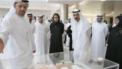 On a visit to Khalifa University yesterday to look at students’ projects and the subjects they study were FNC members, from left, Noura Al Kaabi, Mohamed Ahmed Al Murr, Hamad Al Rahoumi and Mouna Al Bahar. Fatima Al Marzooqi / The National