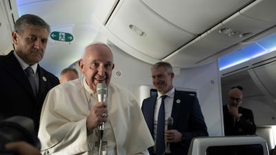 Pope Francis on the flight back to Rome on Sunday, after his four-day journey to Bahrain. AFP