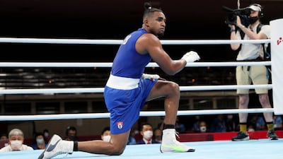 Arlen Lopez of Team Cuba celebrates after winning the gold medal in the Men's Light Heavy (75-81kg) final.