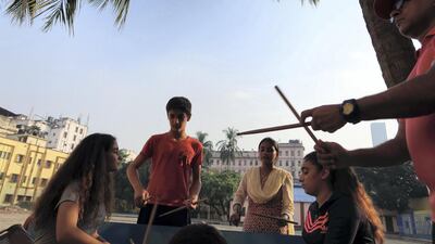 The students take drumming classes. Courtesy Jenny Gustafsson