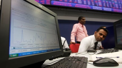A broker monitors the stock market at the Colombo Stock Exchange. Photo: Reuters