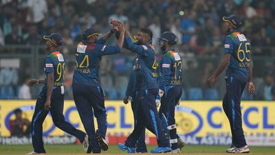 Sri Lanka's Wanindu Hasaranga, centre, after the dismissal of India's Ishan Kishan. AP