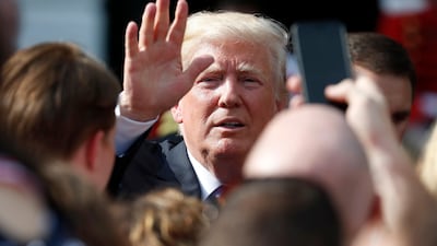 President Donald Trump's travel ban is proving more popular than ever - but only after the policy was distanced from the President