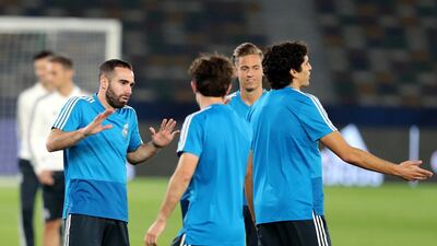 Dani Carvajal, left, gestures during training.