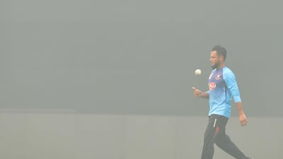 Bangladesh's Arafat Sunny during training as thick smog envelopes the Arun Jaitley Cricket Stadium in New Delhi on Friday. AFP