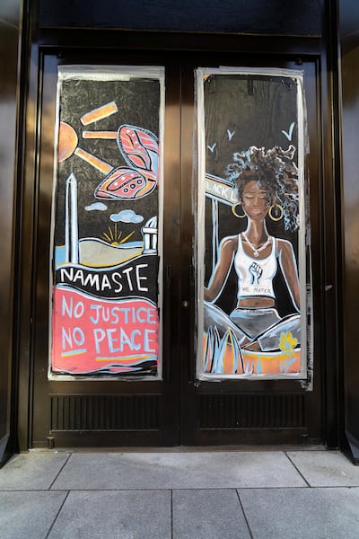 A mural painted in support of Black Lives Matter on the doors of an office building on 16th Street in Washington DC. Sophie Tremblay for The National