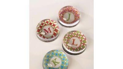 Initial paperweights. Courtesy of The Letteroom