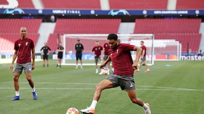 Liverpool's Joe Gomez controls the ball during training. AP Photo
