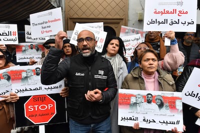 President of the Tunisian press union Zied Dabbar speaks during a rally calling for the release of journalist Zied El Heni. AFP