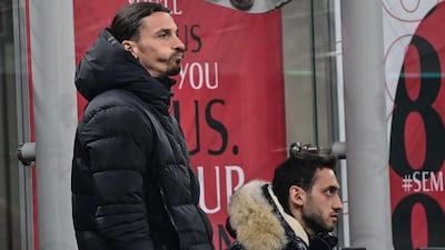 AC Milan's Swedish forward Zlatan Ibrahimovic watches the action from the sidelines. AFP