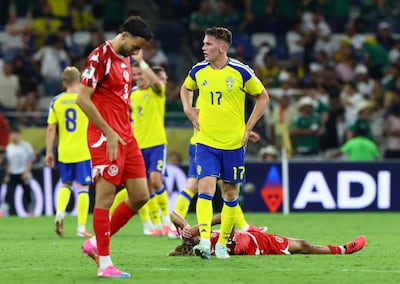 Tunisia’s Hannibal Mejbri looks dejected after their defeat by Sweden. Reuters