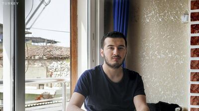 Emre says he has no need for loyalty cards and prefers to use his credit card for purchases.