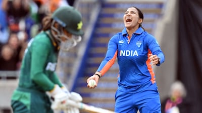 India's Sneh Rana celebrates taking the catch of Pakistan's Muneeba Ali. AFP